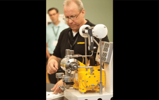 Tacmina Staff Providing A Pump Demonstration At A Technical Conference